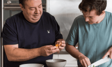 Peter Gilmore cracking eggs with his son