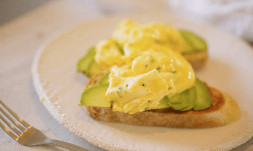 Scrambled eggs on sourdough toast